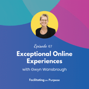 Gwyn has short blond hair, a black jacket and is smiling.